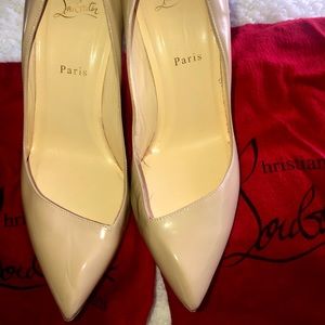 Gently worn with shoe bags and box. 4 inch heel.